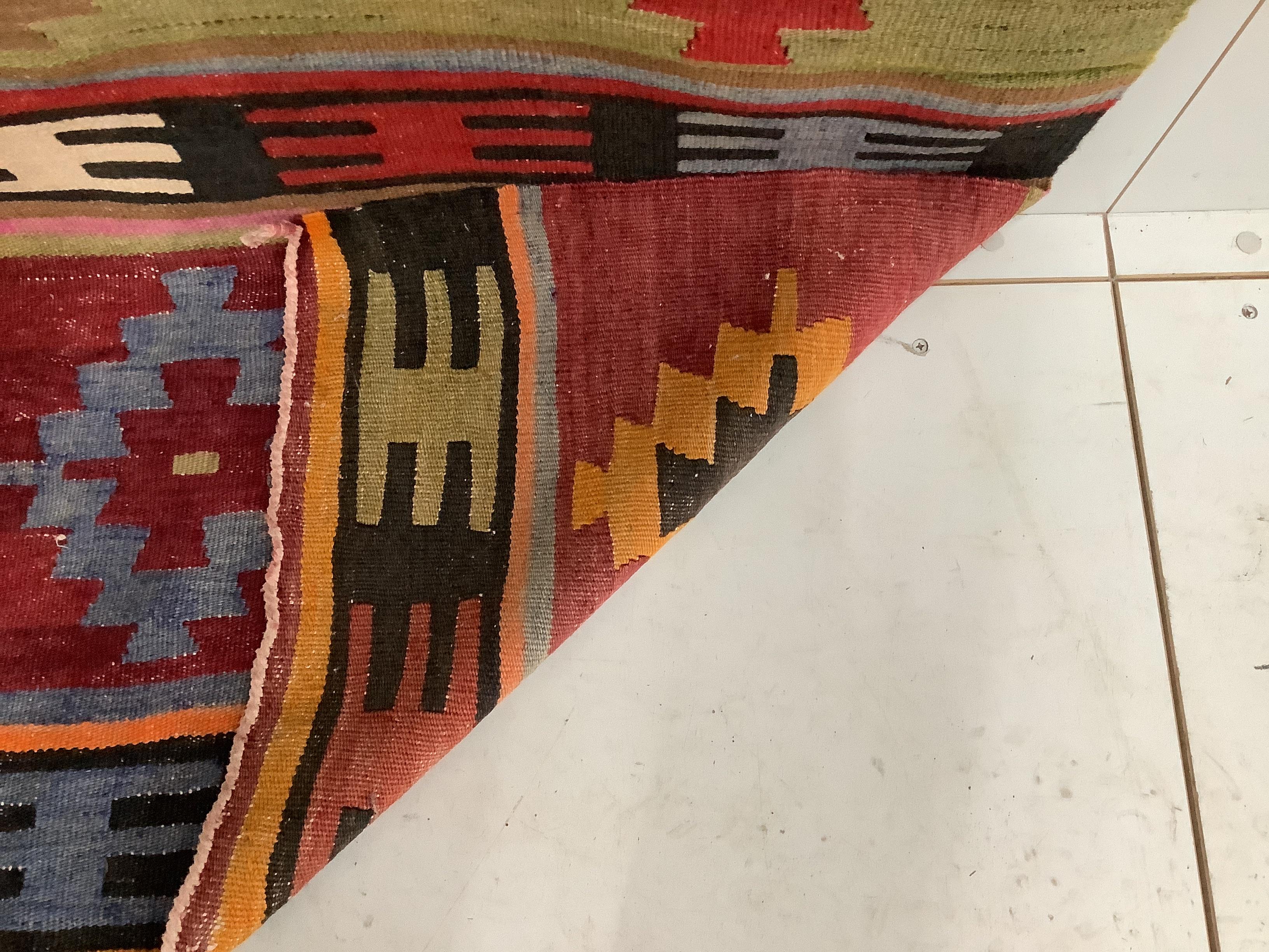 A Kilim flatweave carpet, approx. 280 x 280cm